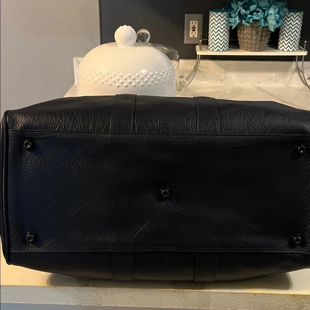 Burberrys Dark Navy Leather Bag with Embroidered Patch
